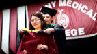 A student getting their degree at the Albany Medical College 2023 Commencement ceremony