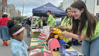 Albany Med students at a community faire in Sheridan Hollow