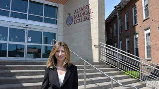 Julia Saltanovich, assistant dean of admissions, standing outside Albany Medical College