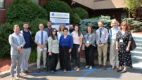 Group of people standing in front of the Department of Psychiatry sign