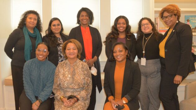 Albany Medical College and Albany Medical Center representatives pose for a picture with an official from the College of St. Rose at a 2022 event celebrating women in medicine and science.
