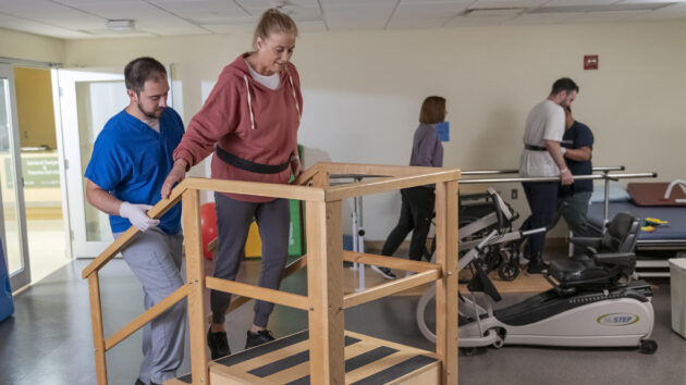 working out in the physical therapy gym