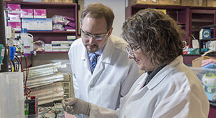 Two Albany Medical College researchers in the lab