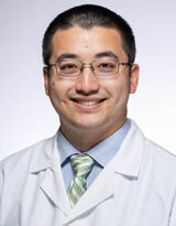 Portrait photo of Andrew Ku